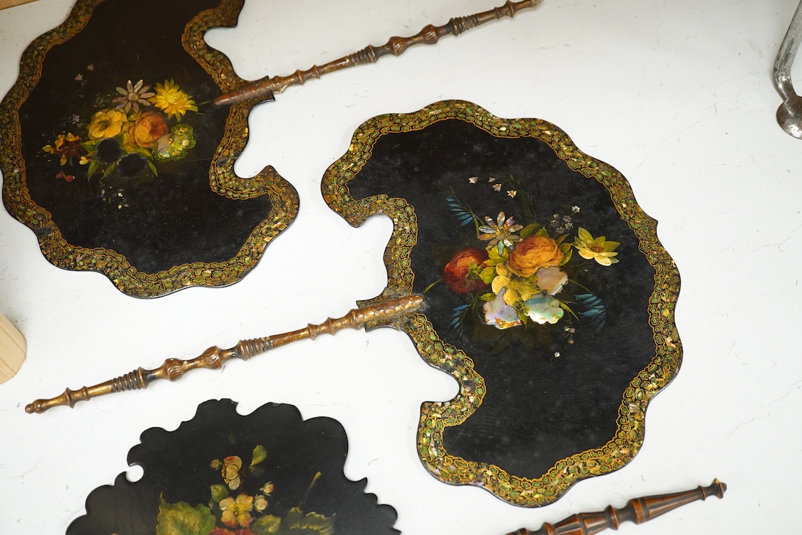Three early Victorian papier maché hand screens, two with abalone inlay, 39cm in length